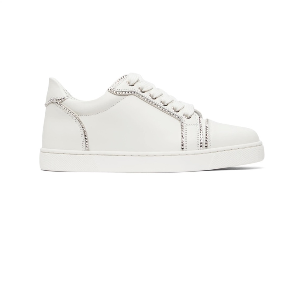 used christian louboutin sneakers. worn twice. comes with box and dust bag